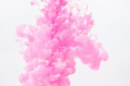 An abstract pink blob on white background.